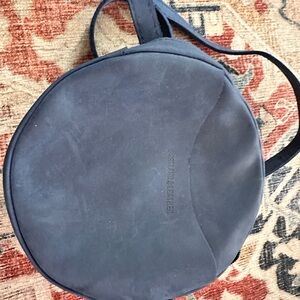 Portland round leather cross body